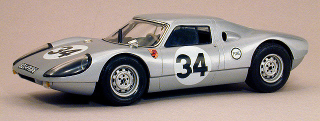 The 911 kits to have one steel wheel; it's a spare wheel. I used eight of them for a pair of curbside Monogram 904 kits I built recently.